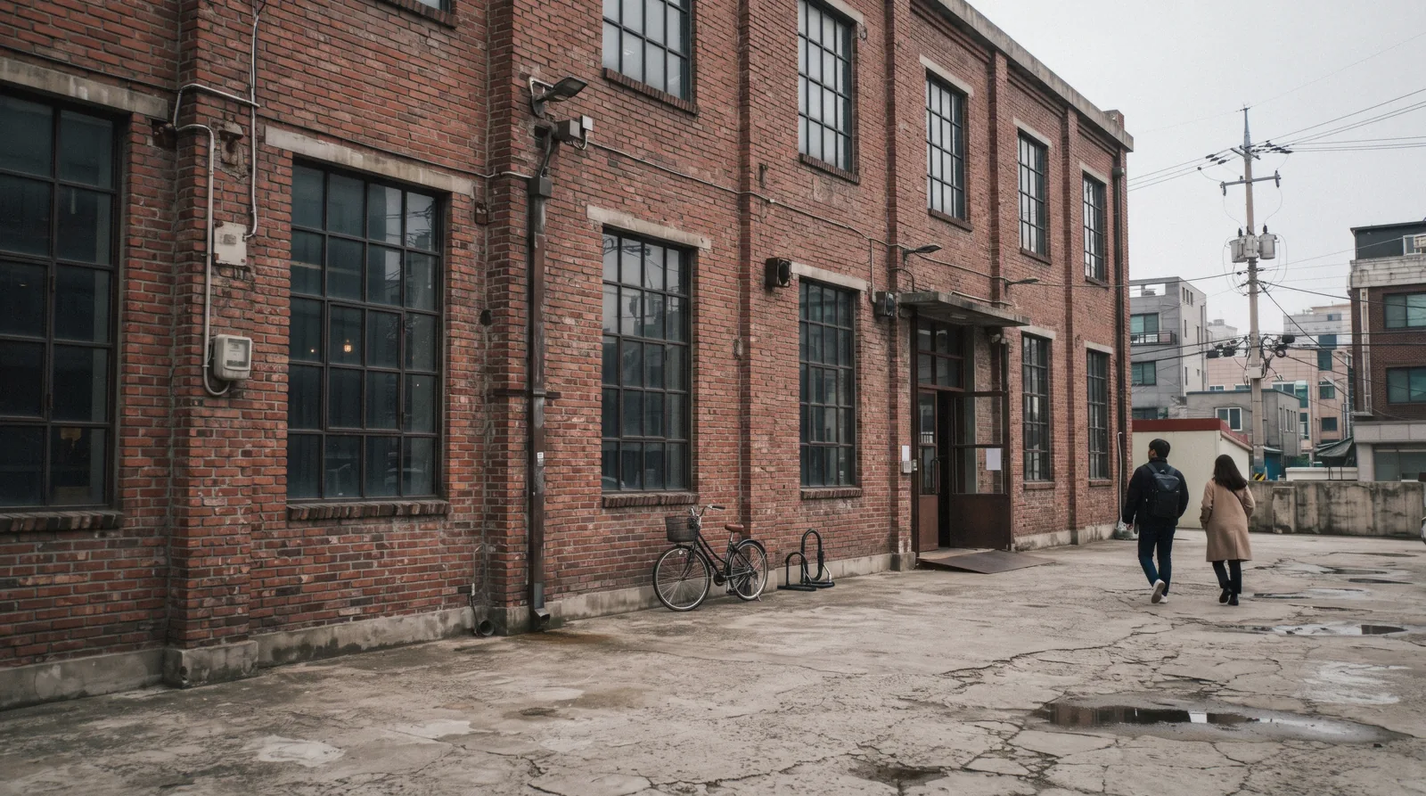A red-brick converted factory with a bicycle outside in Seongsu-dong, Seoul, South Korea